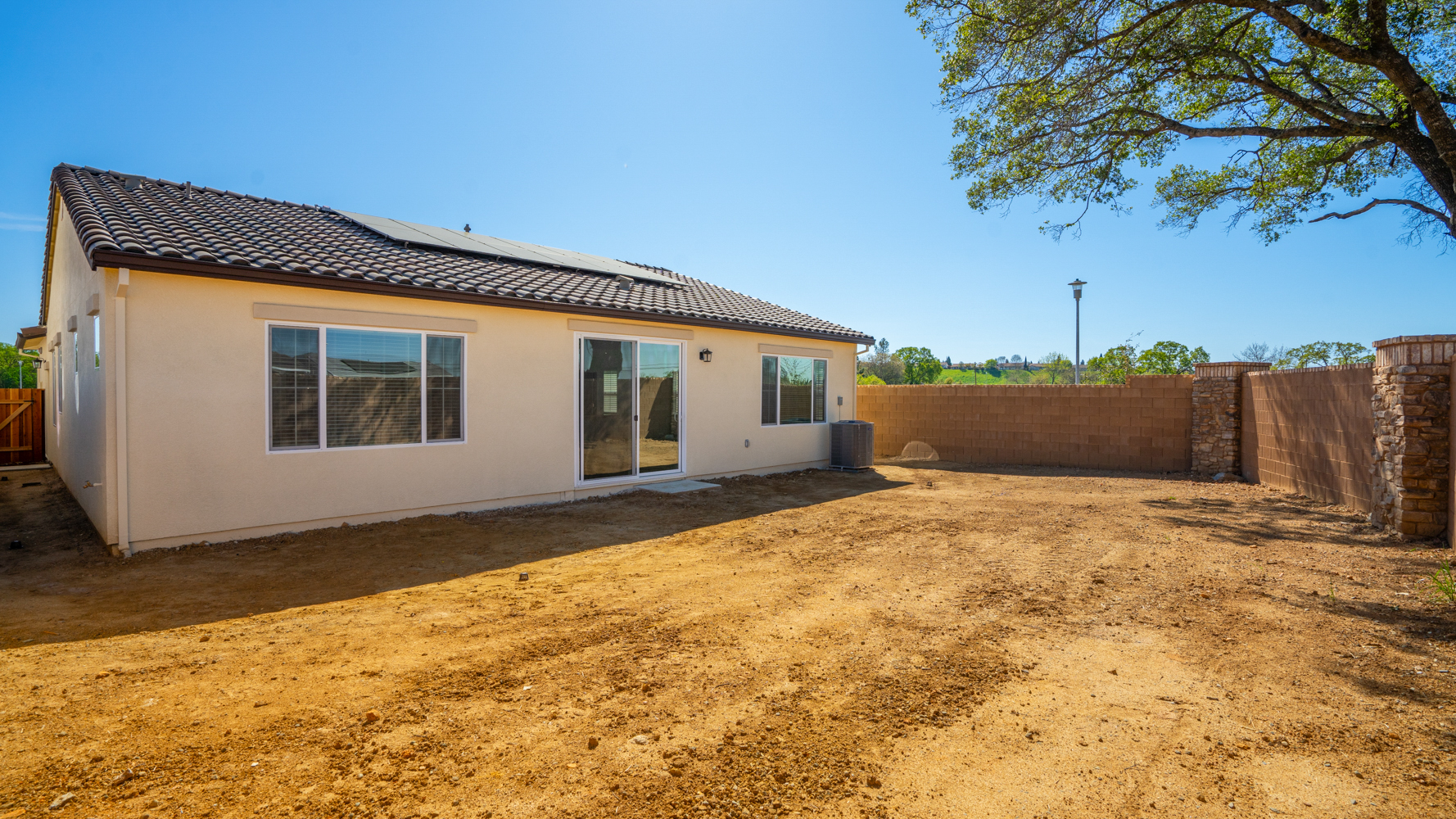 A house with a fence around it.