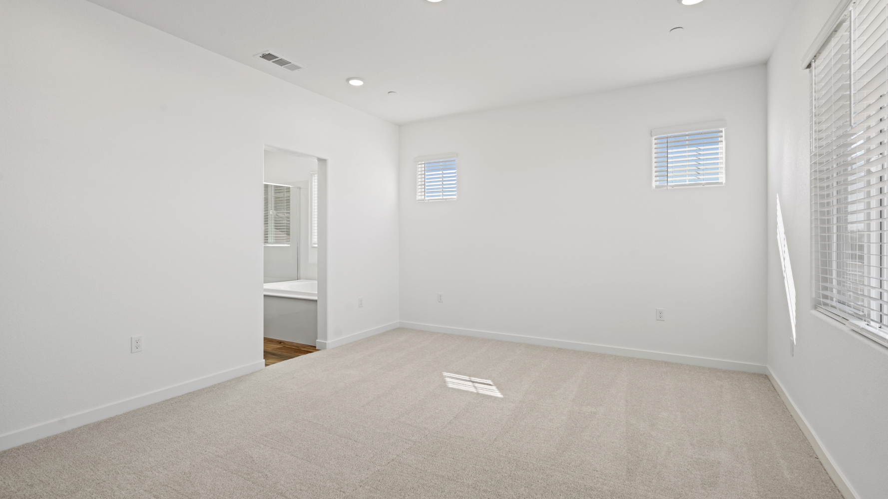 A room with a sink and a toilet.