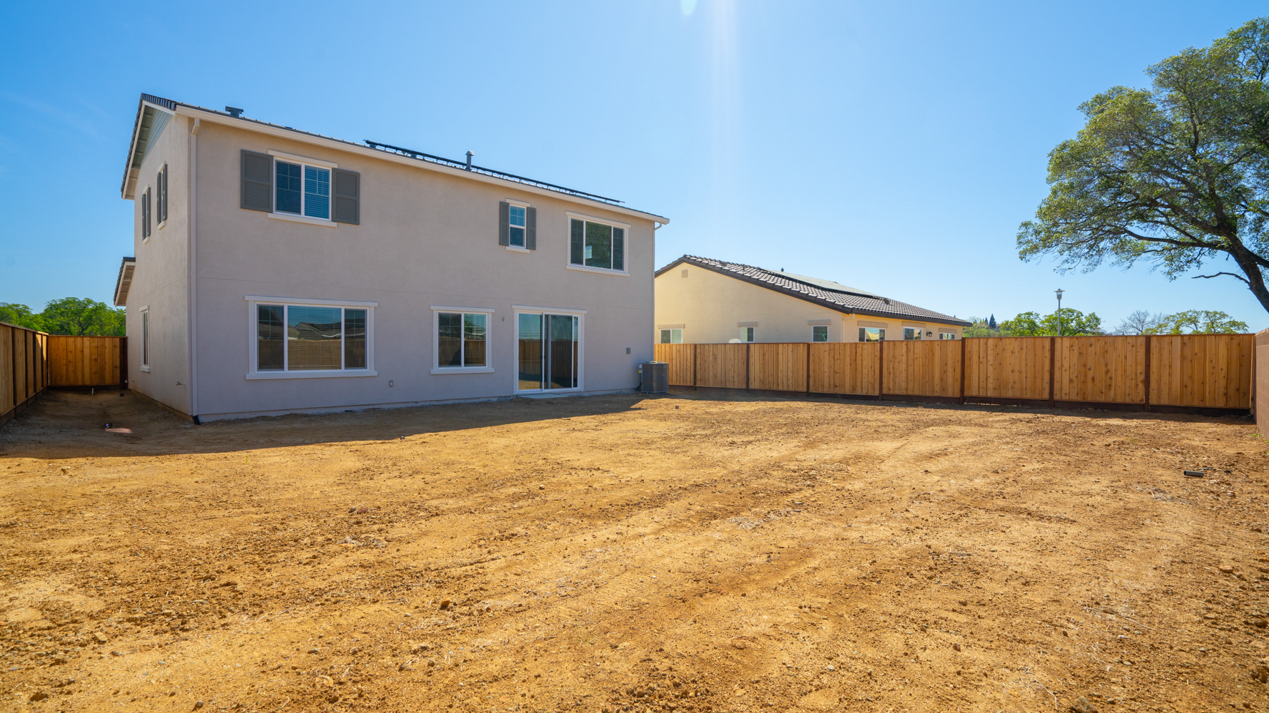 A house with a fence around it.