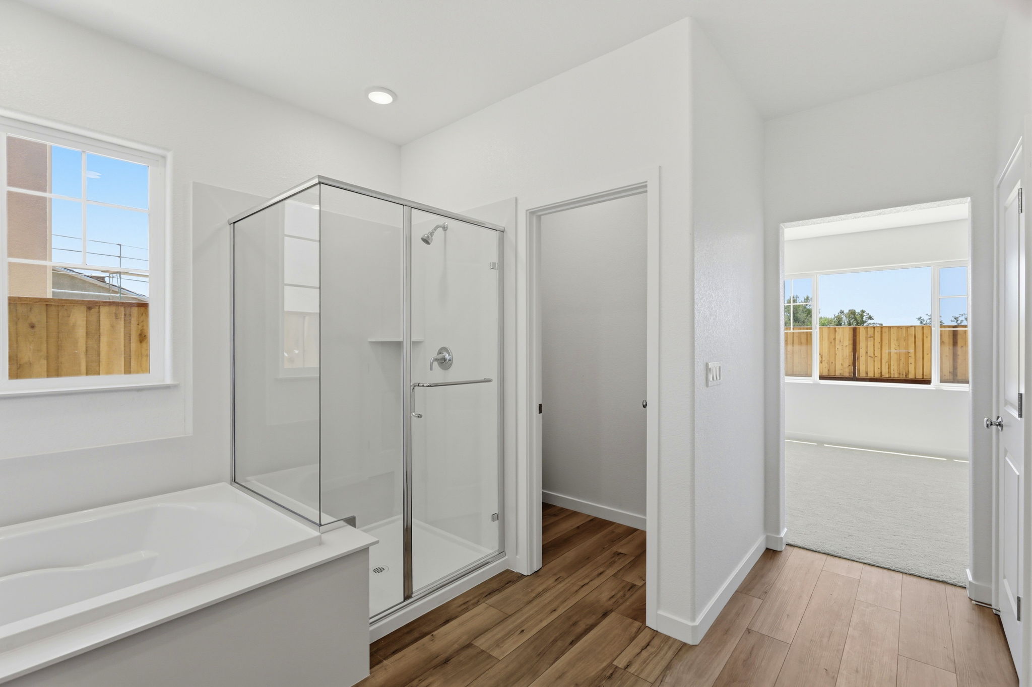 A bathroom with a glass shower.