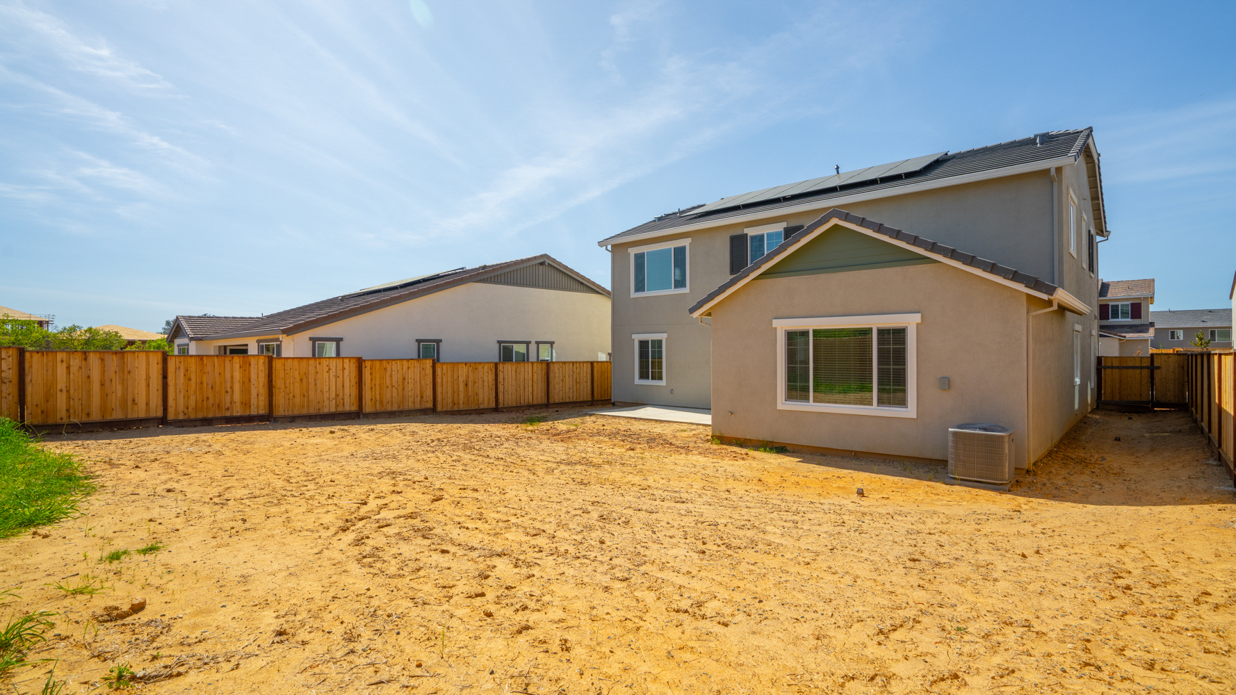 A house with a fence around it.