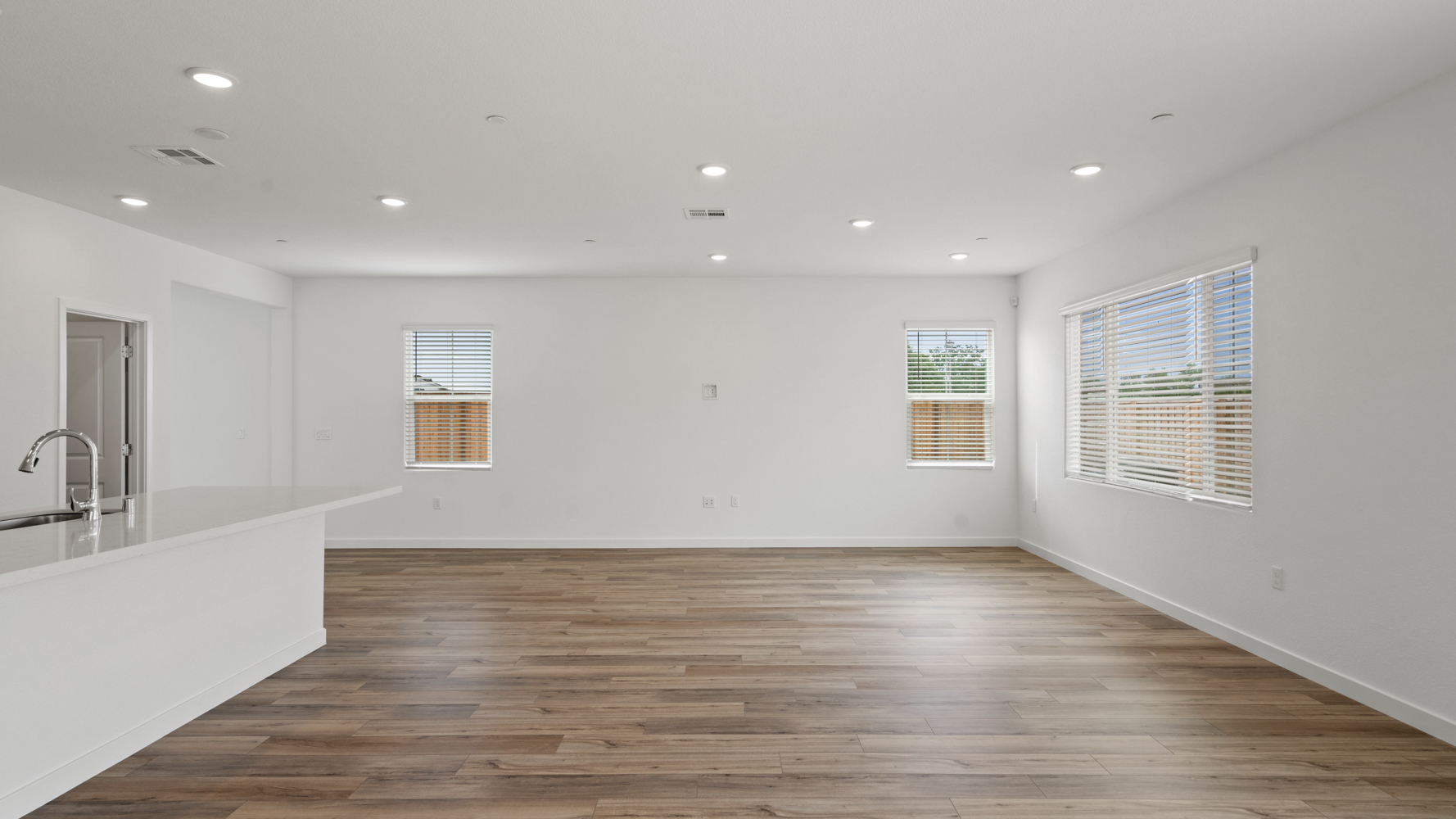 A bathroom with a tub and a sink.