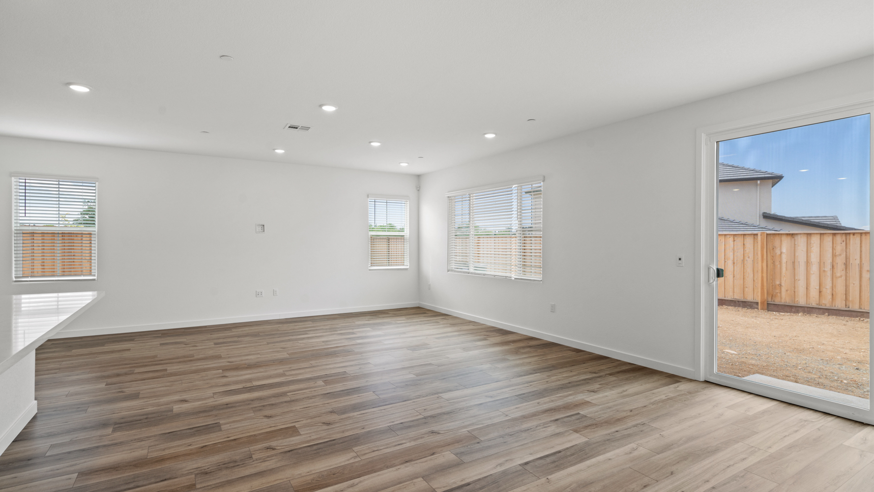A room with a wood floor and a wood floor.