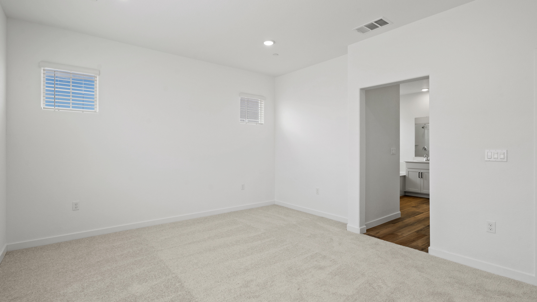 A room with a door and a window.