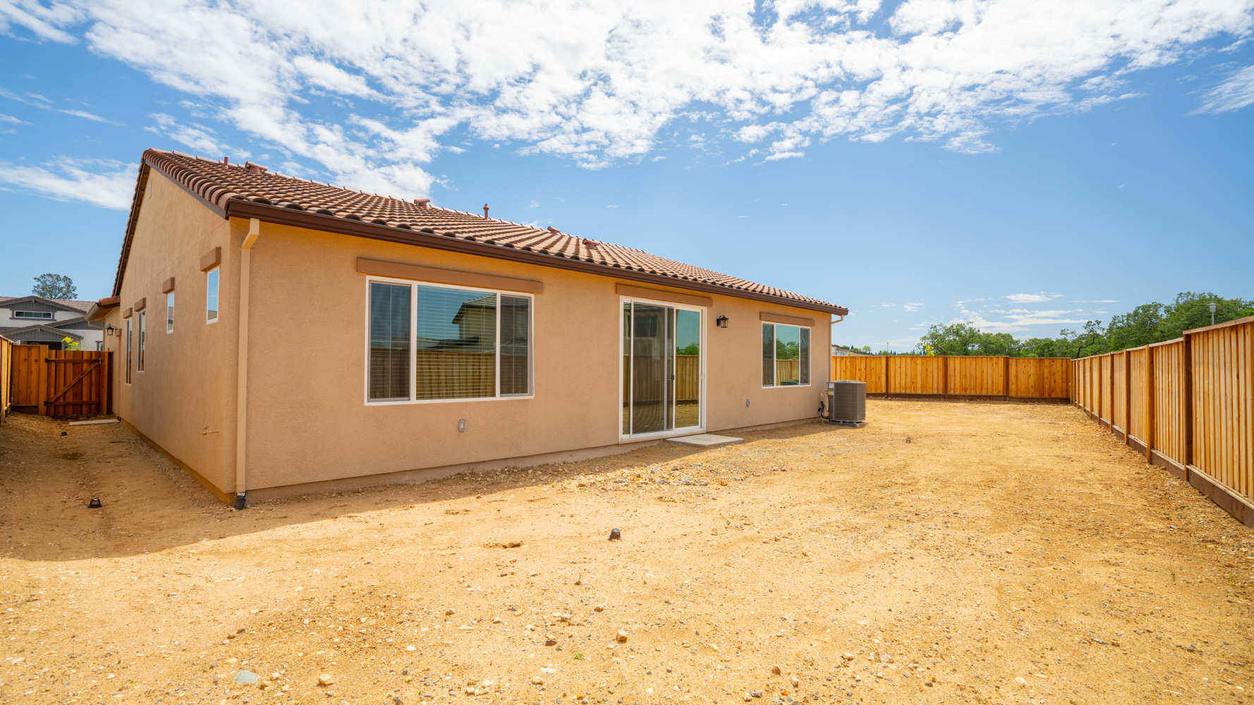 A house with a fence around it.