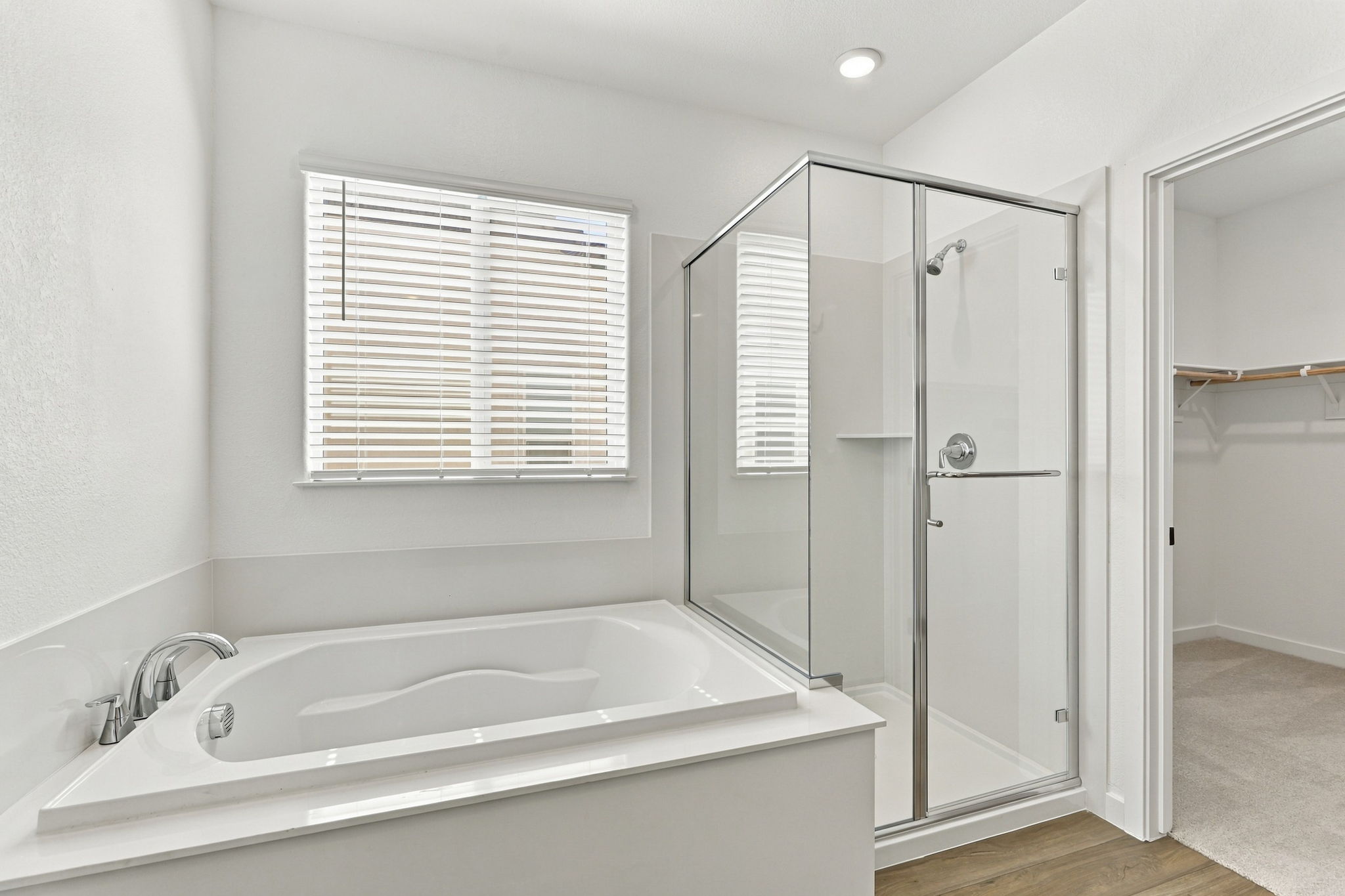 A bathroom with a glass shower.