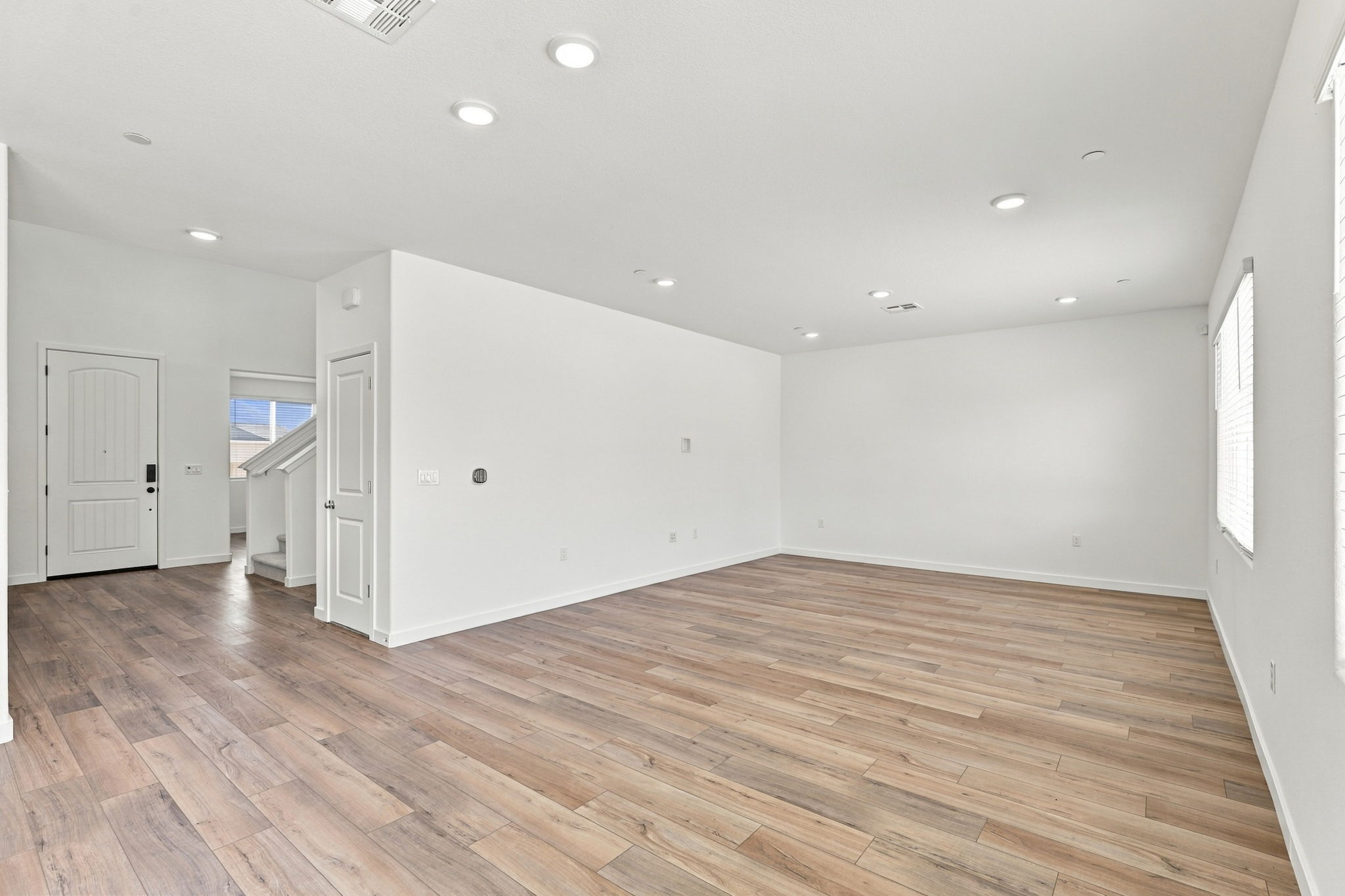 A room with wood floors.