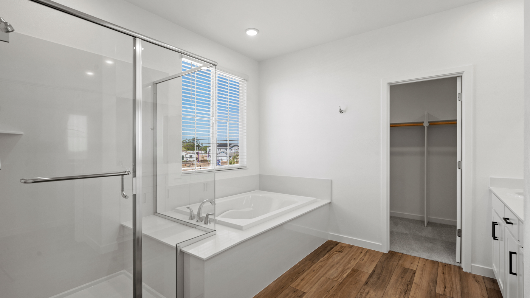 A bathroom with a glass shower.