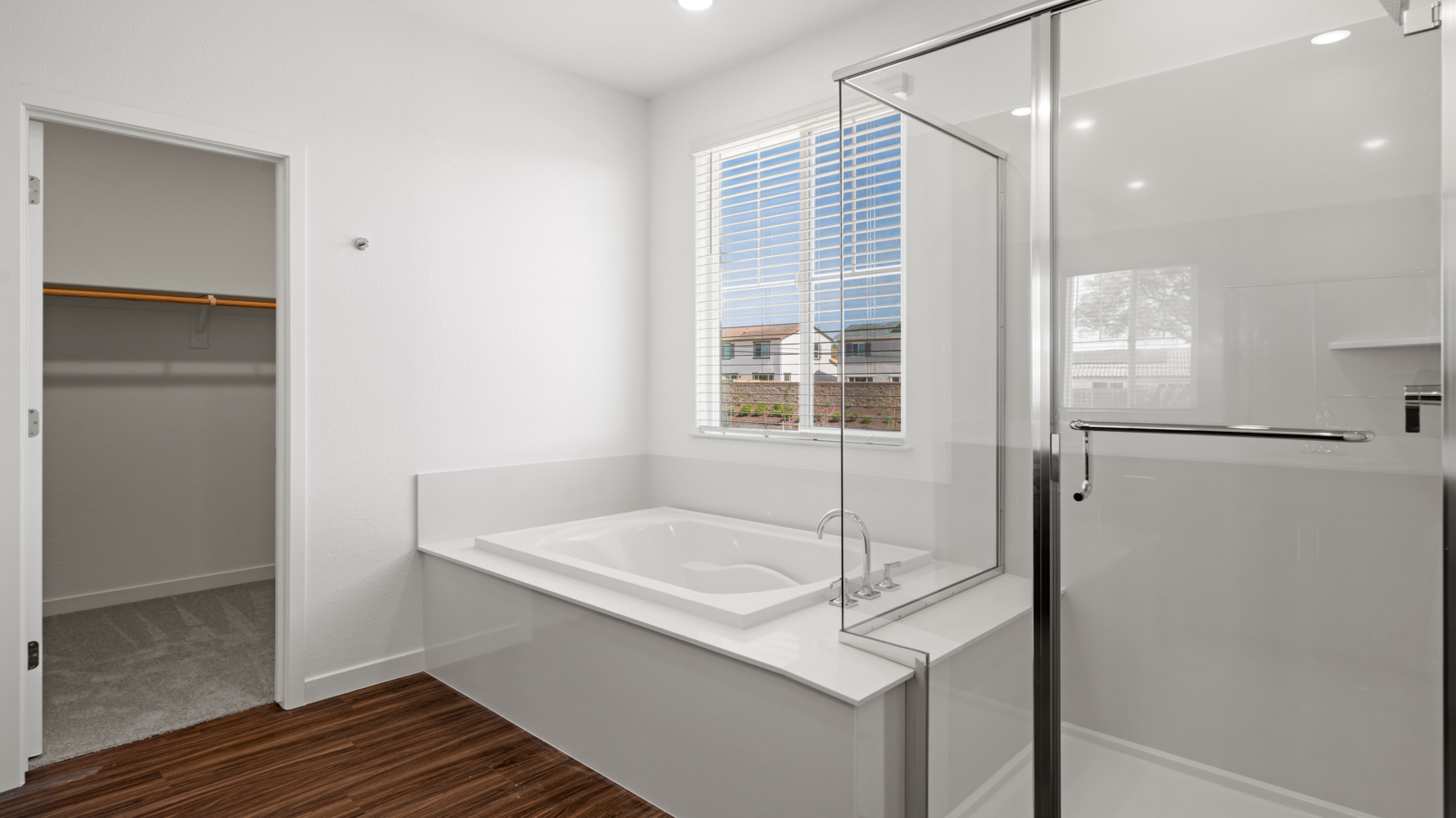 A bathroom with a glass shower.