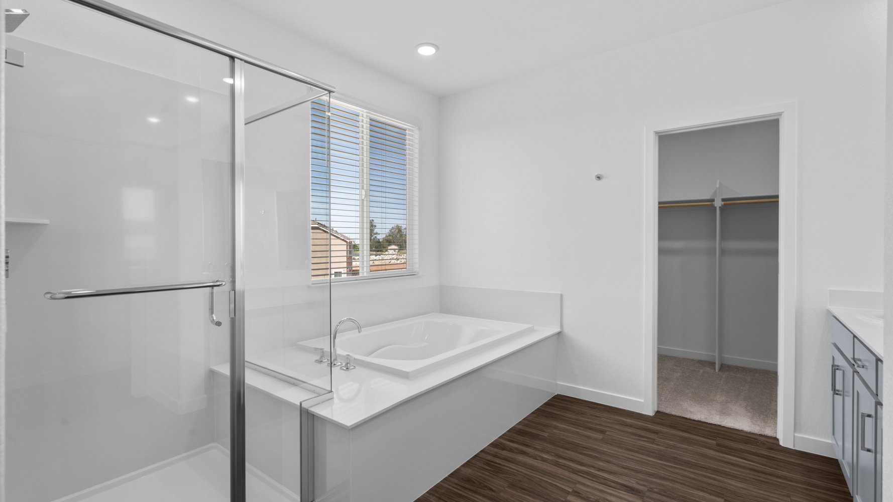 A bathroom with a glass shower.