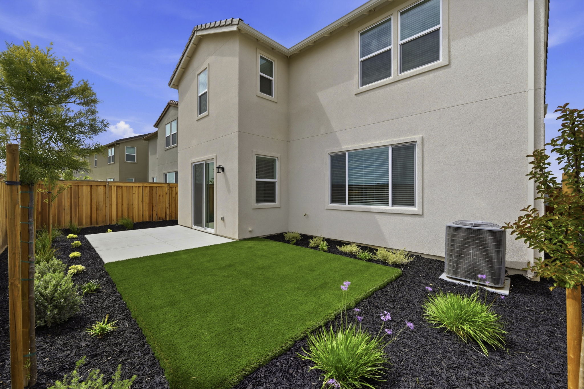 A house with a green yard.