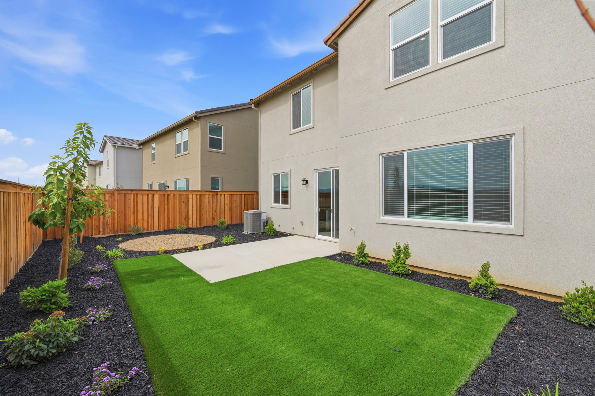 A house with a green yard.