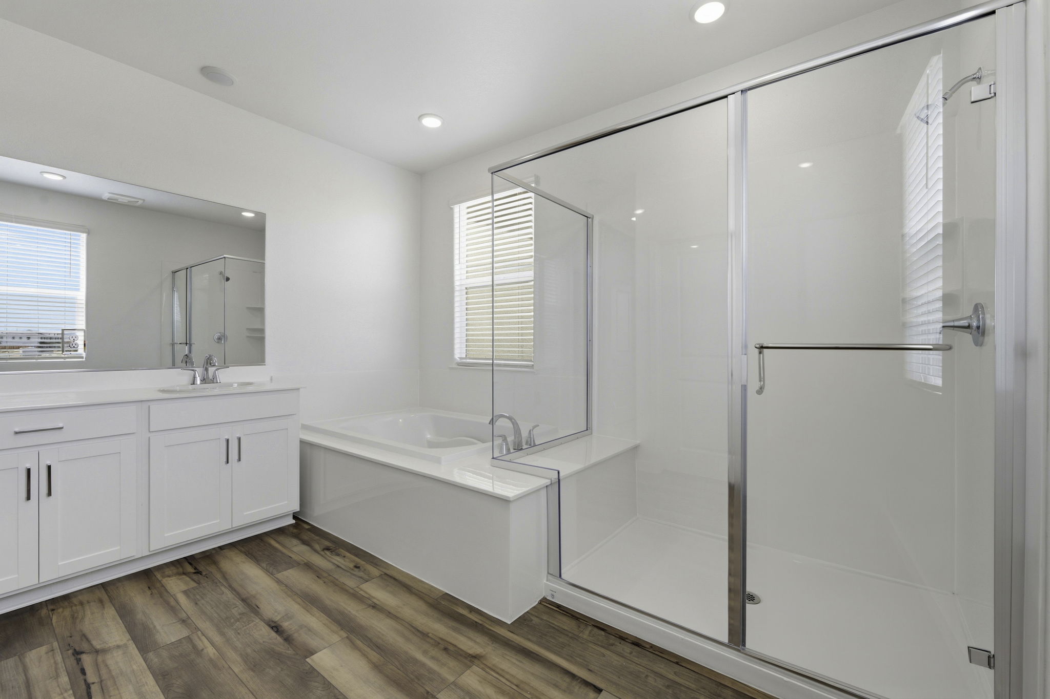 A bathroom with a glass shower.