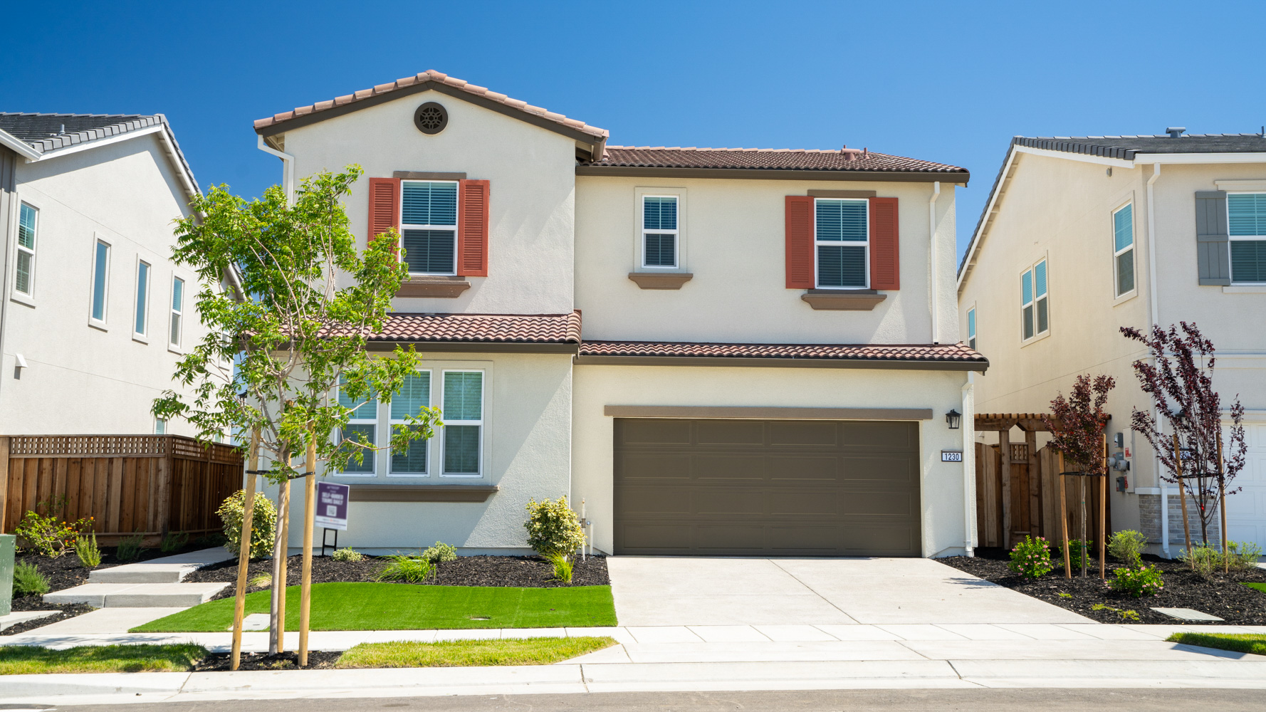 A large house with a garage.