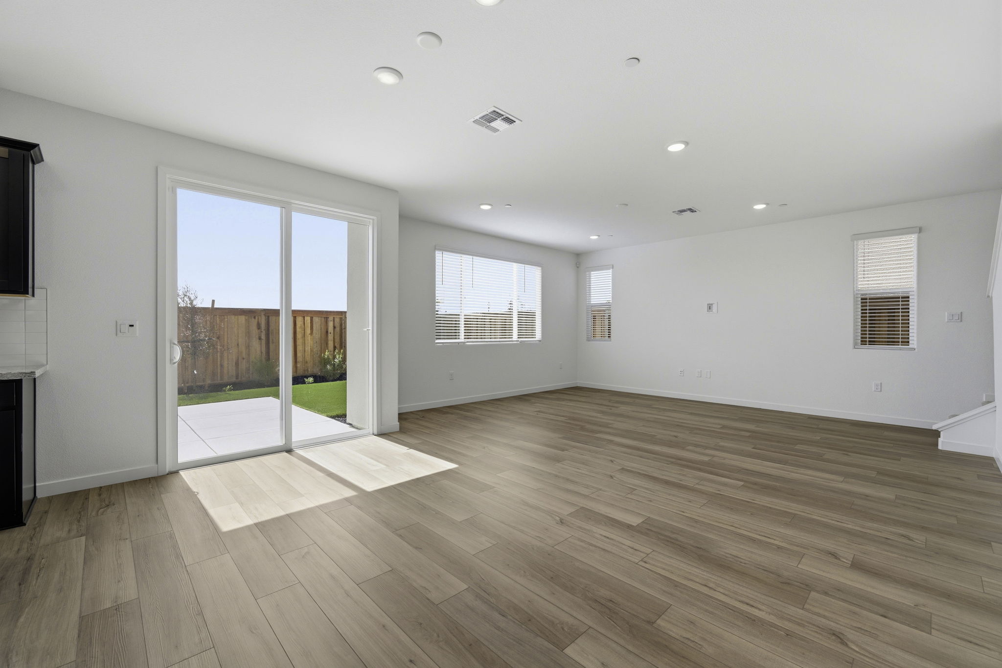 A room with a wood floor and a wood floor.