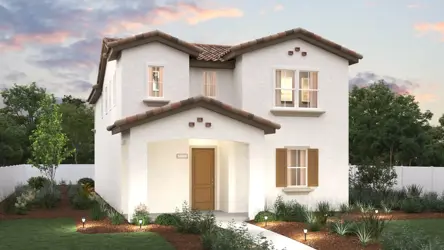 A house with a large front yard.