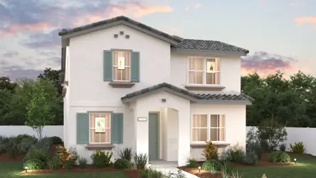 A white house with green shutters.