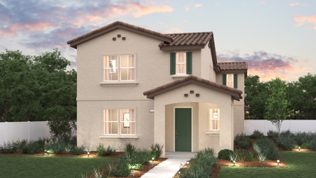 A house with a driveway and a brick driveway.