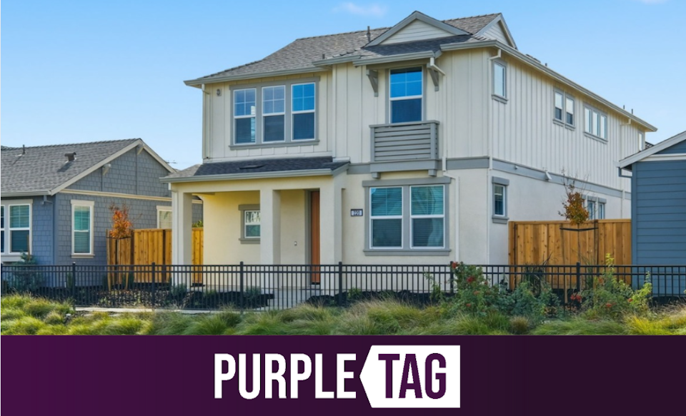 A house with a fence around it.