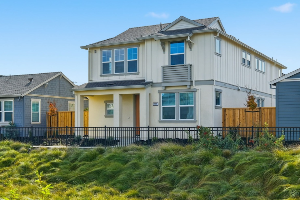 A house with a fence around it.