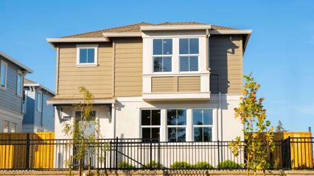 A house with a fence around it.