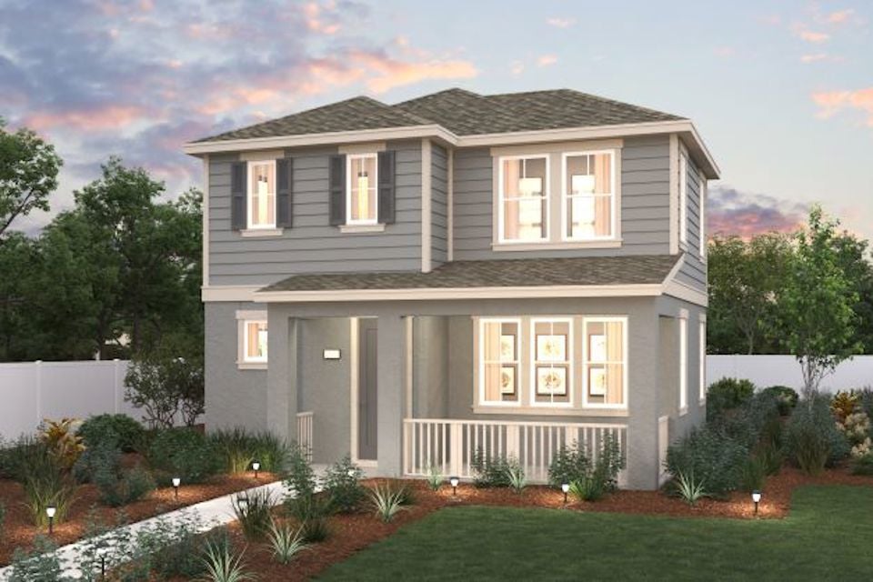 A house with a large front yard.