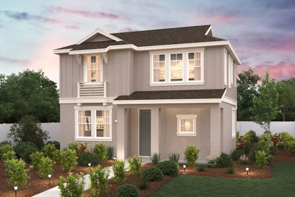 A house with a large front yard.