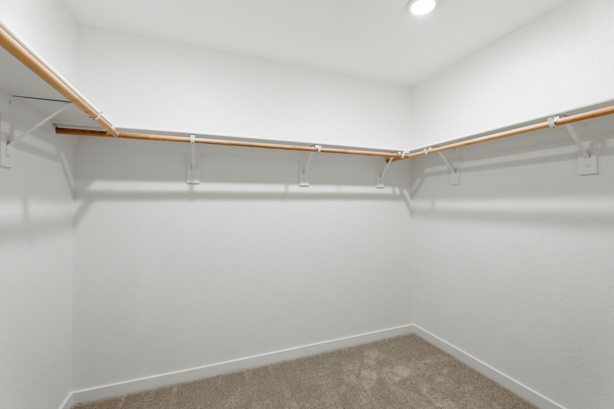 A white room with a white wall.