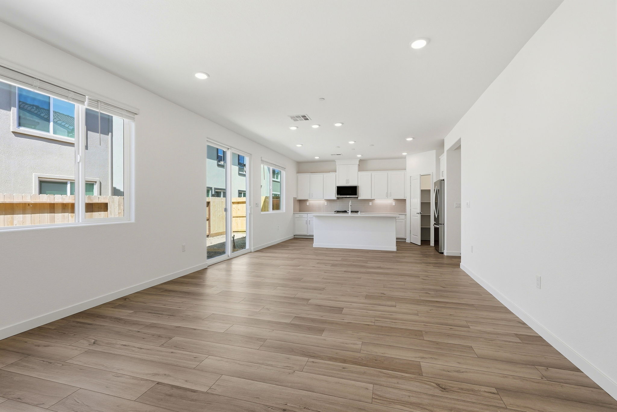 A large empty room with white walls.