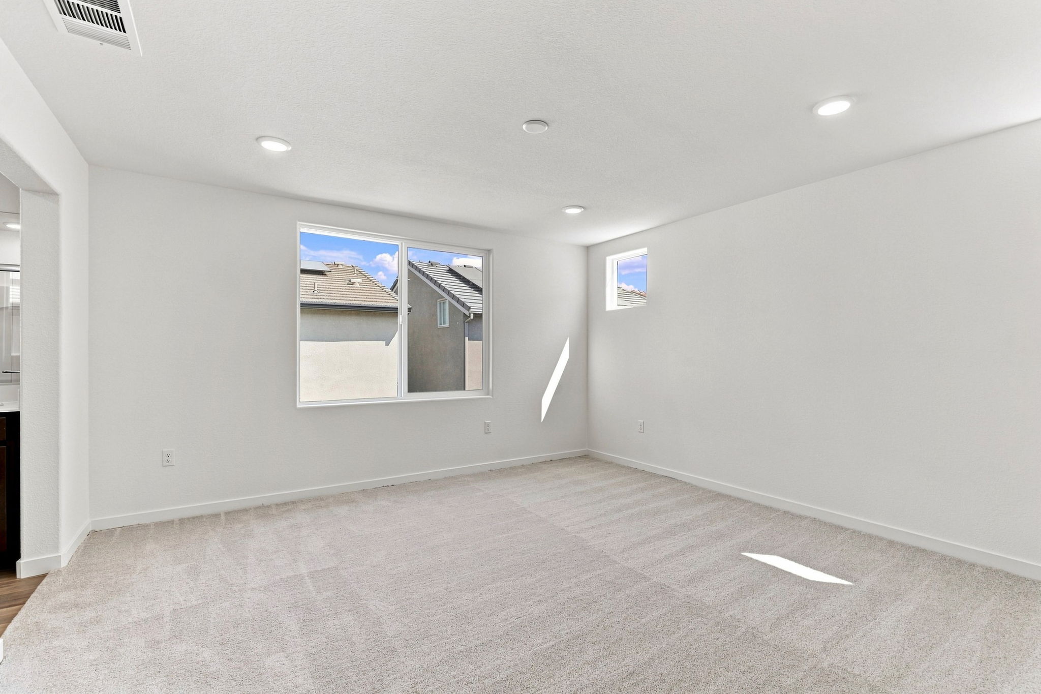 A room with a large window.