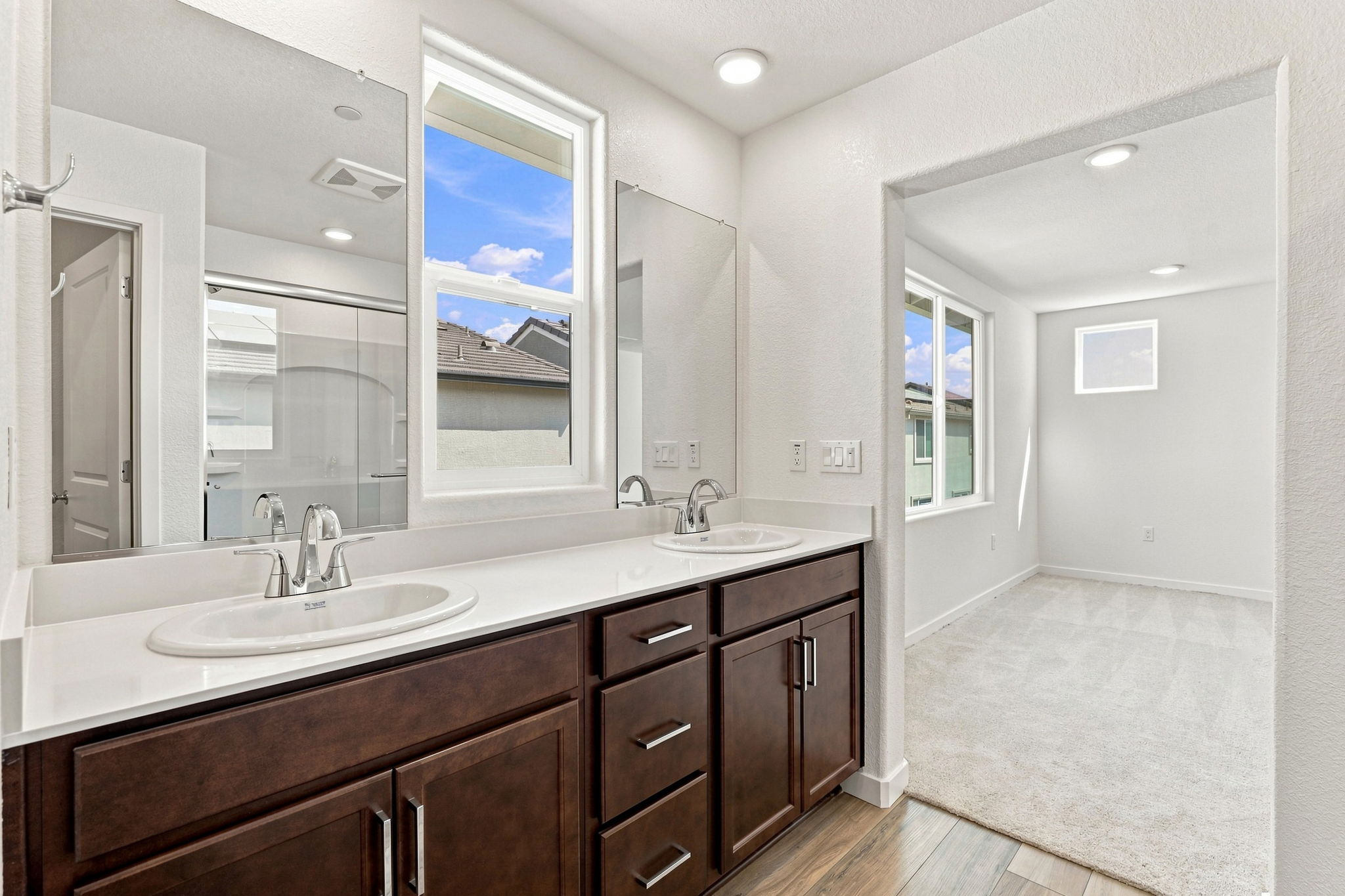 A bathroom with a large window.