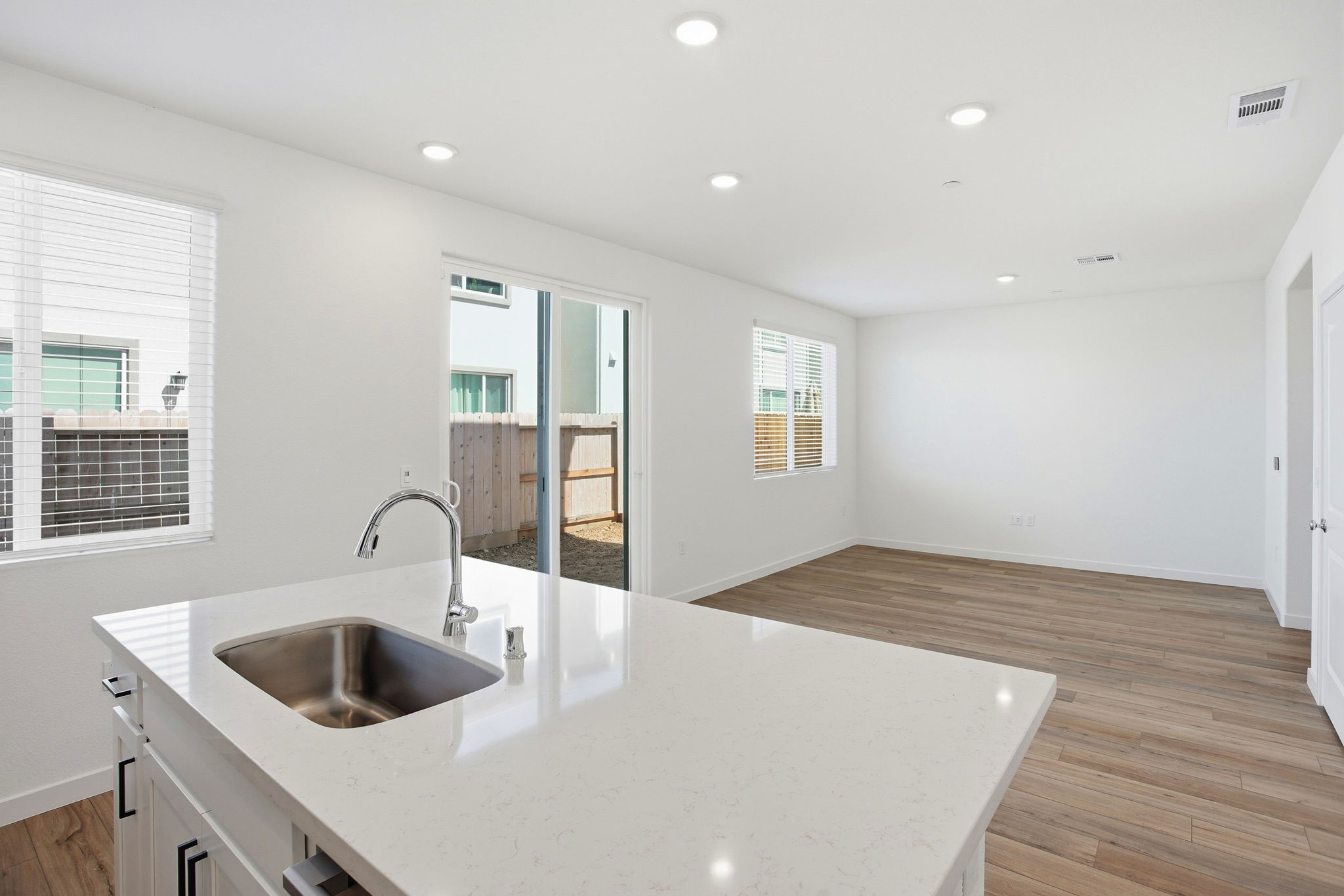 A large kitchen with a large counter.