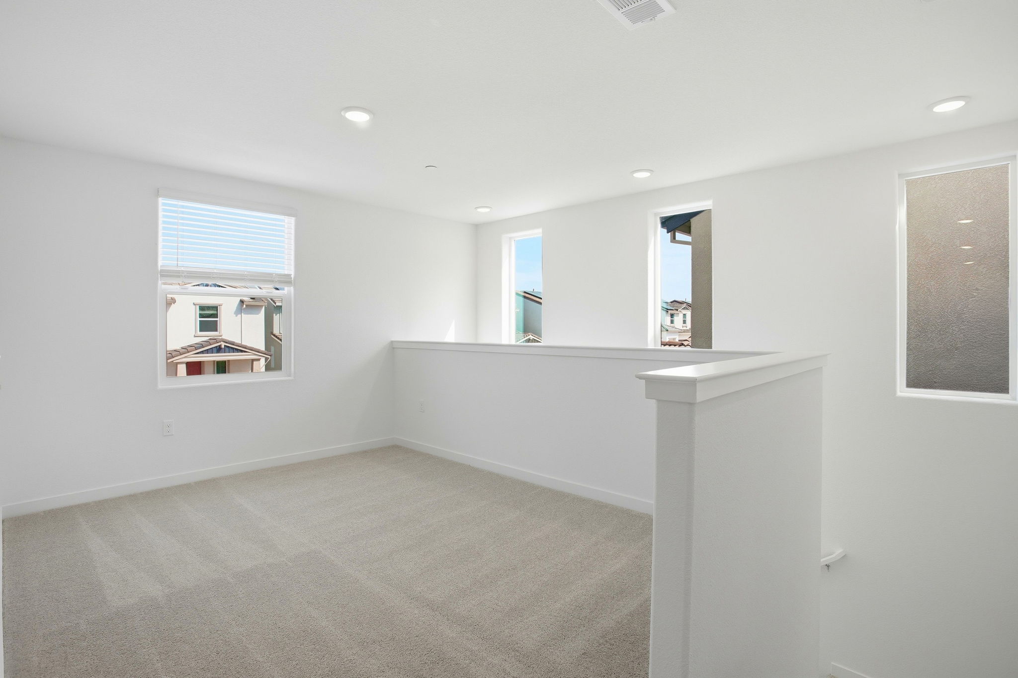 A bathroom with a sink and mirrors.