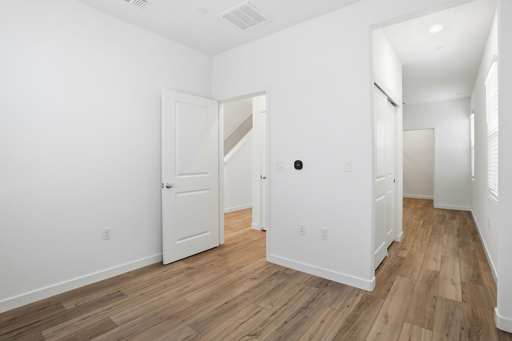 A room with white doors.