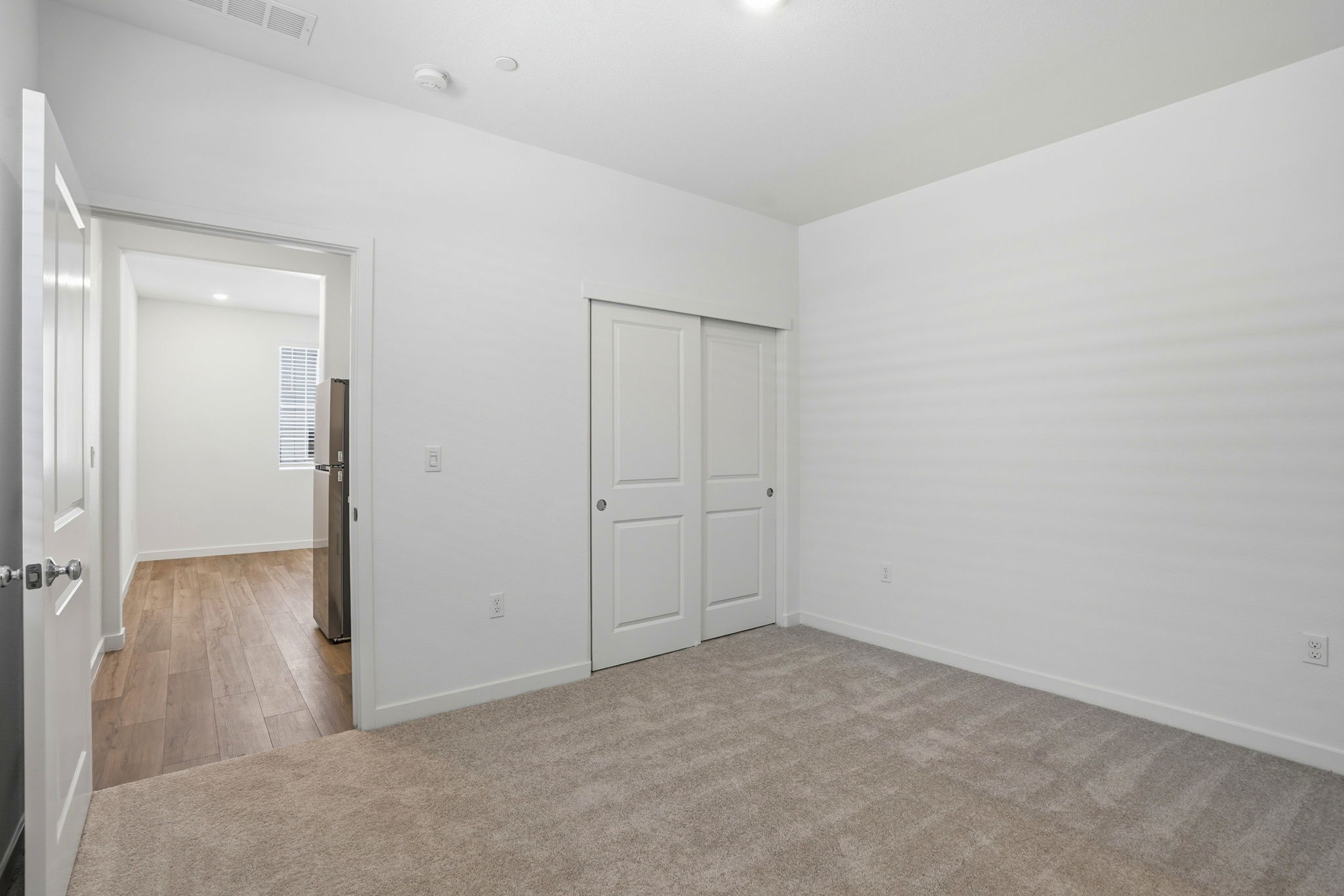 A room with white doors.