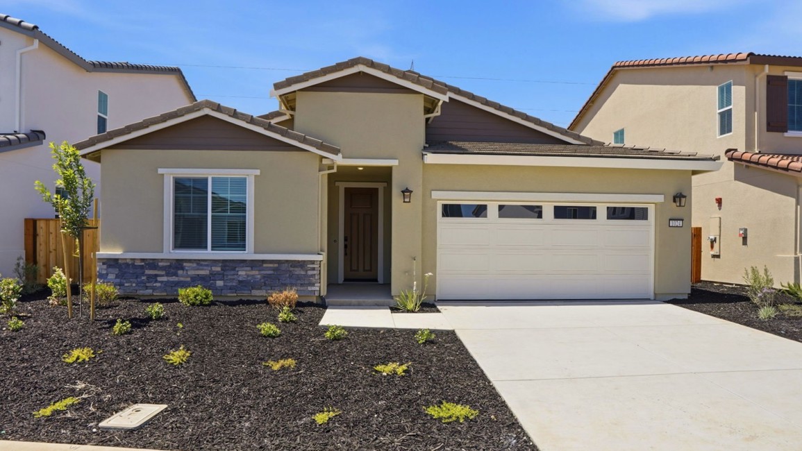 A house with a driveway.