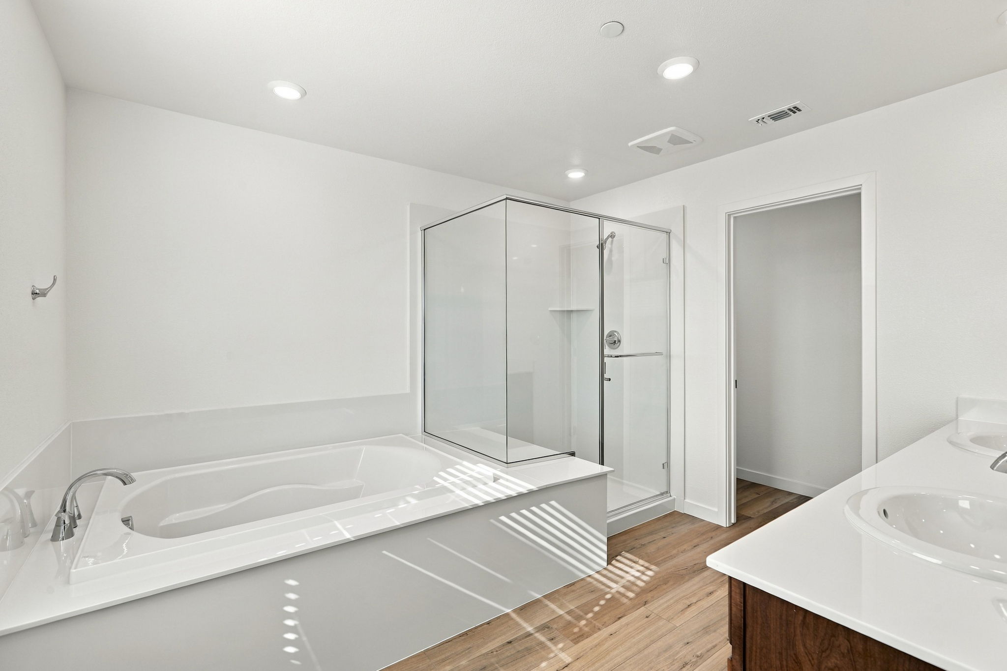 A bathroom with a glass shower.