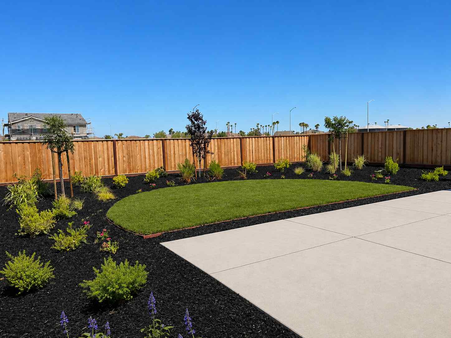 A garden with a fence.