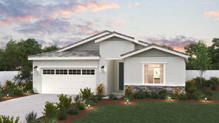 A house with a lawn in front.