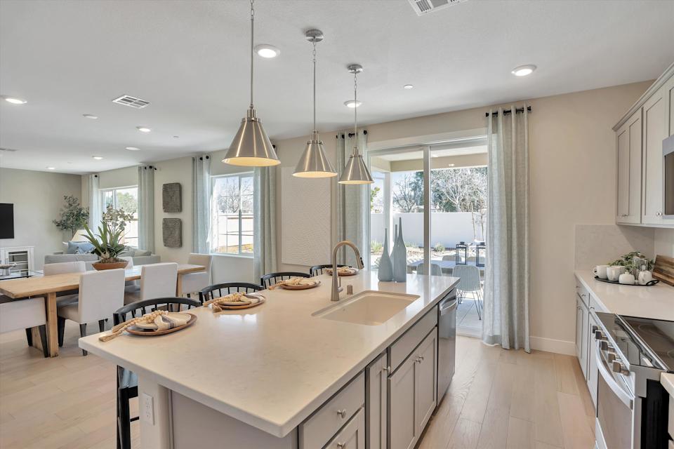 A kitchen with a large island.