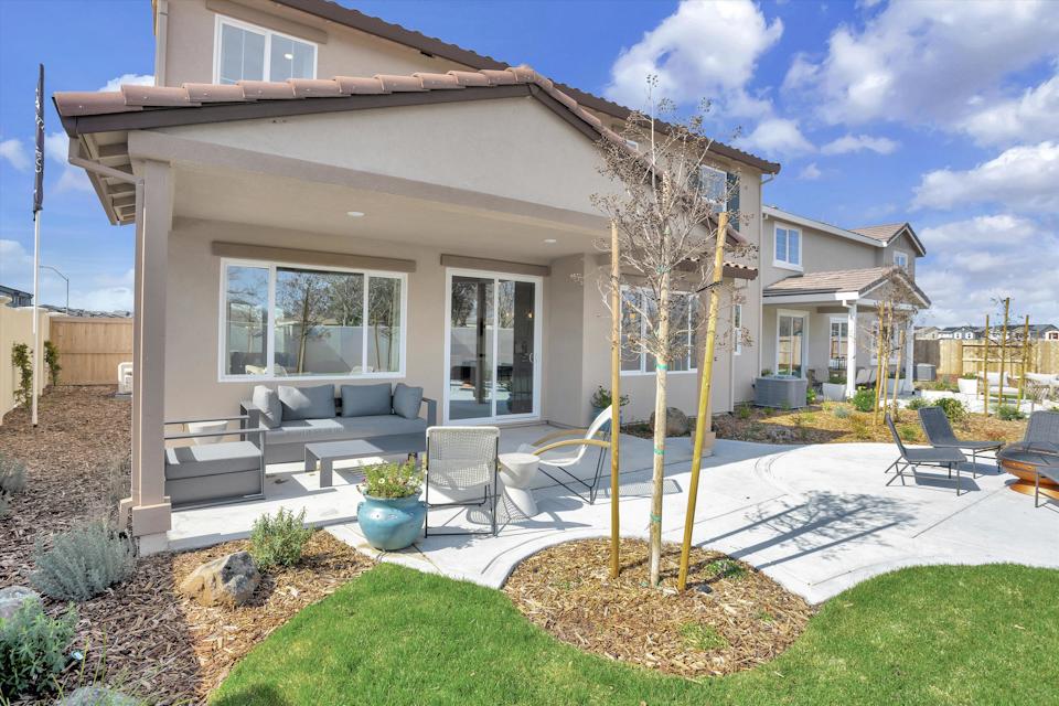 A house with a small patio.