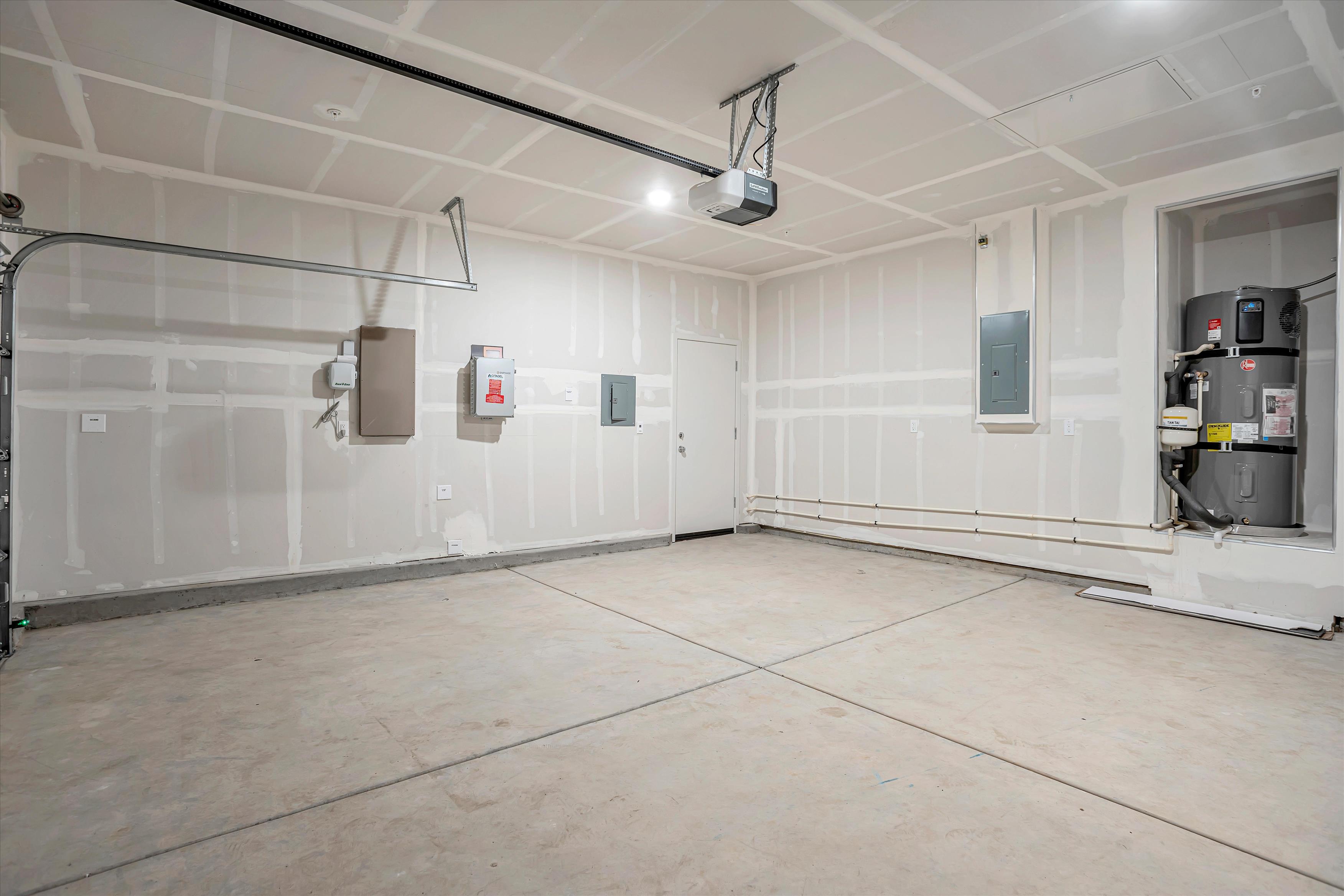 A room with white walls and a few machines.