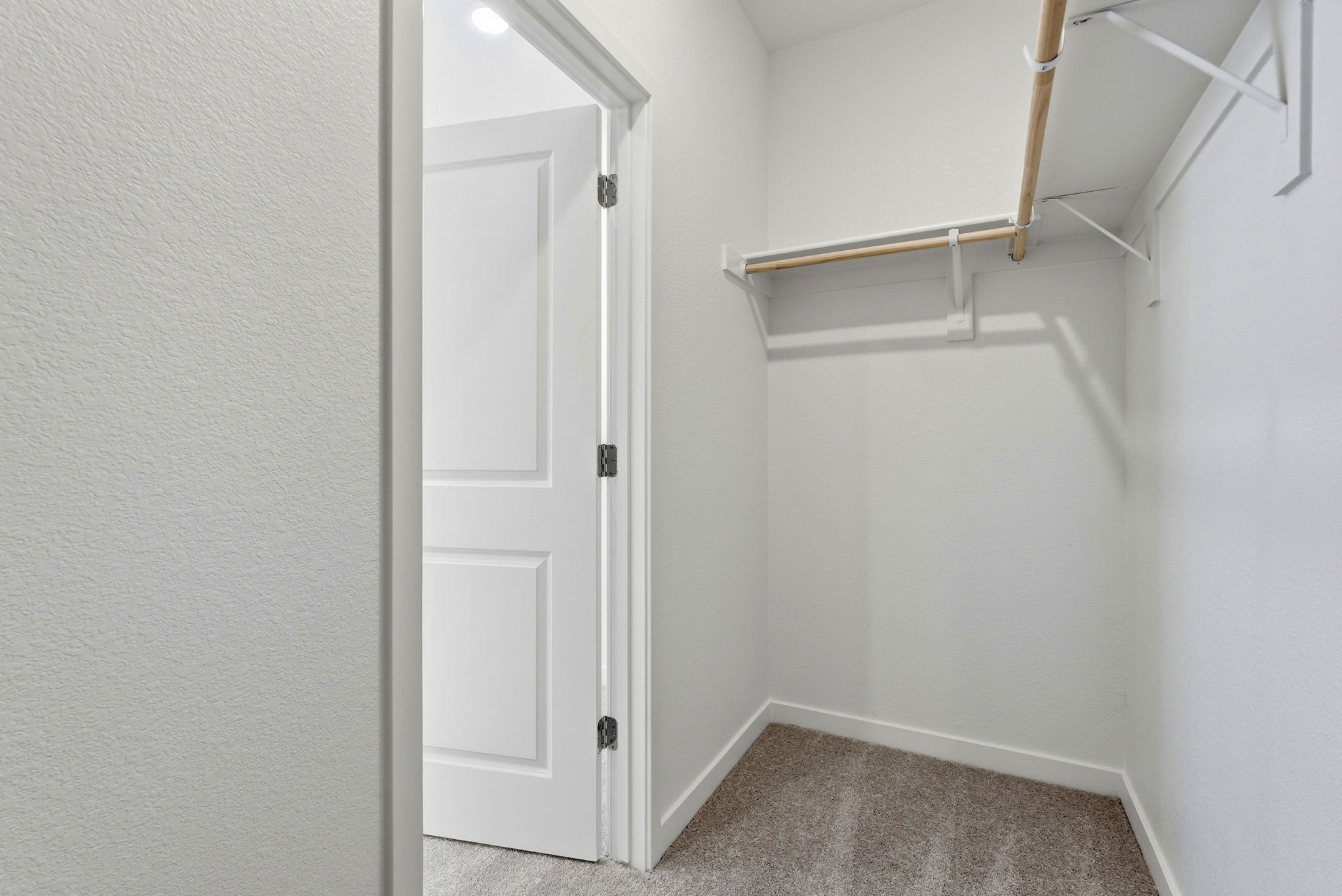 A white door in a room.