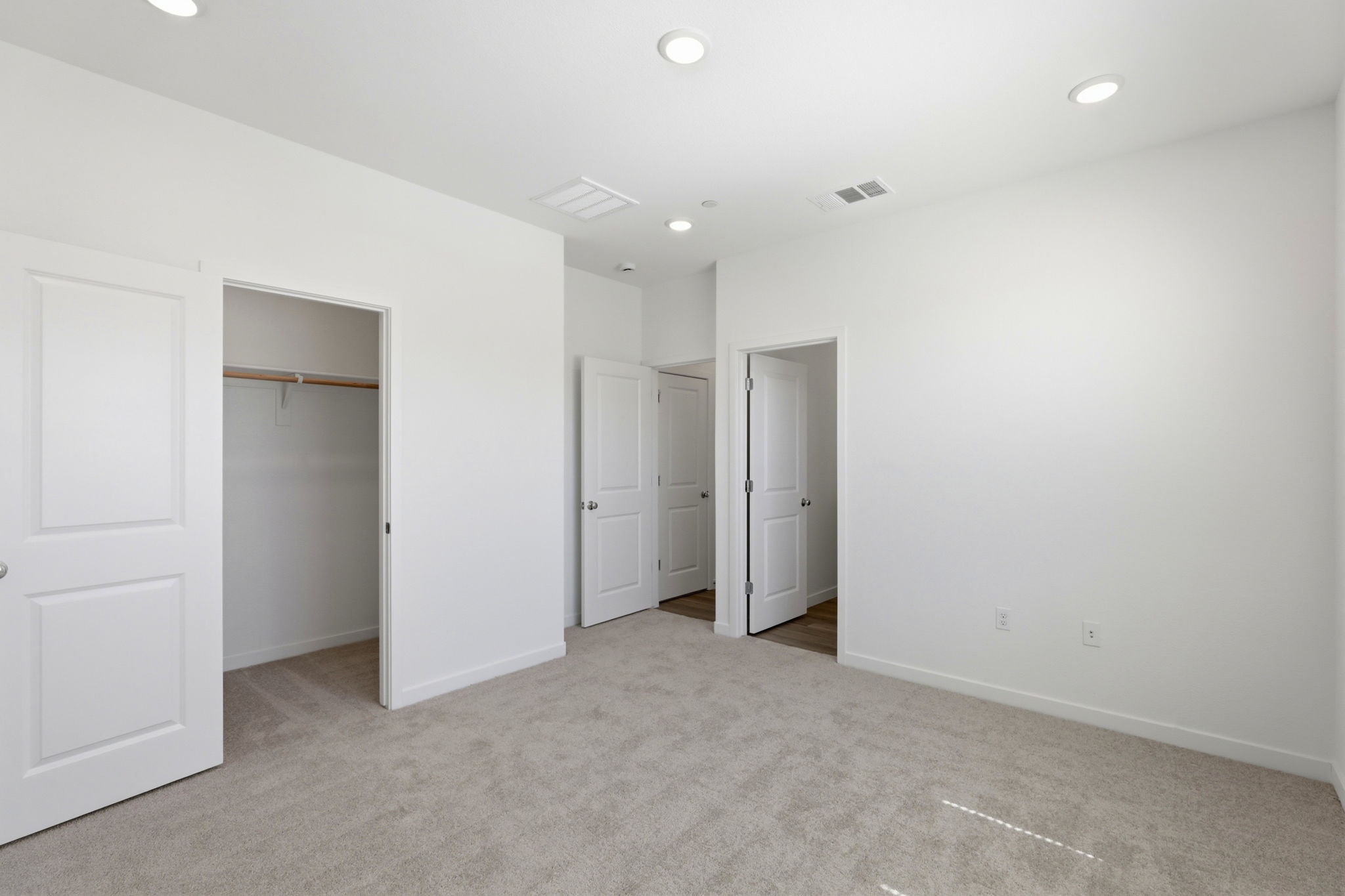 A room with white doors.