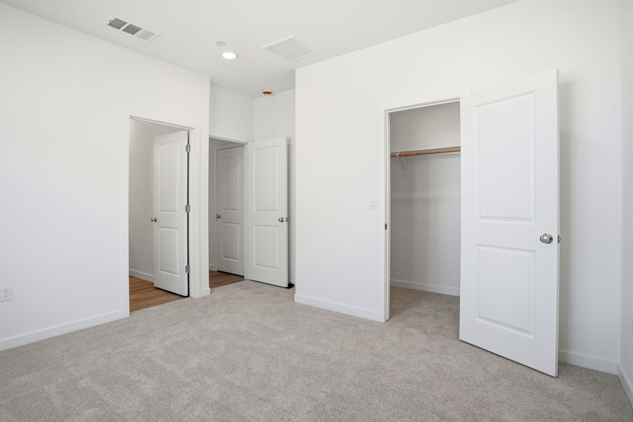 A room with white doors.