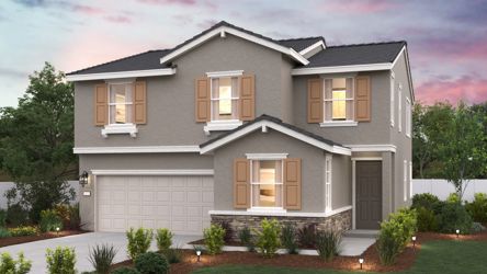 A house with a garage and a lawn in front of it.