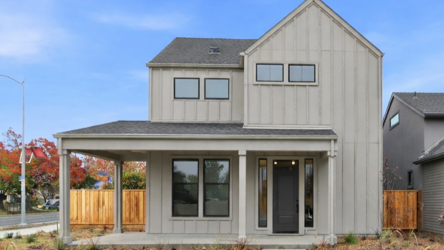 A house with a fence around it.