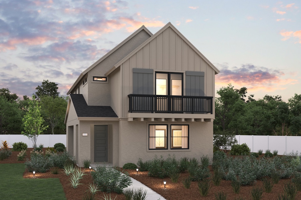 A house with a fence and trees in the back.