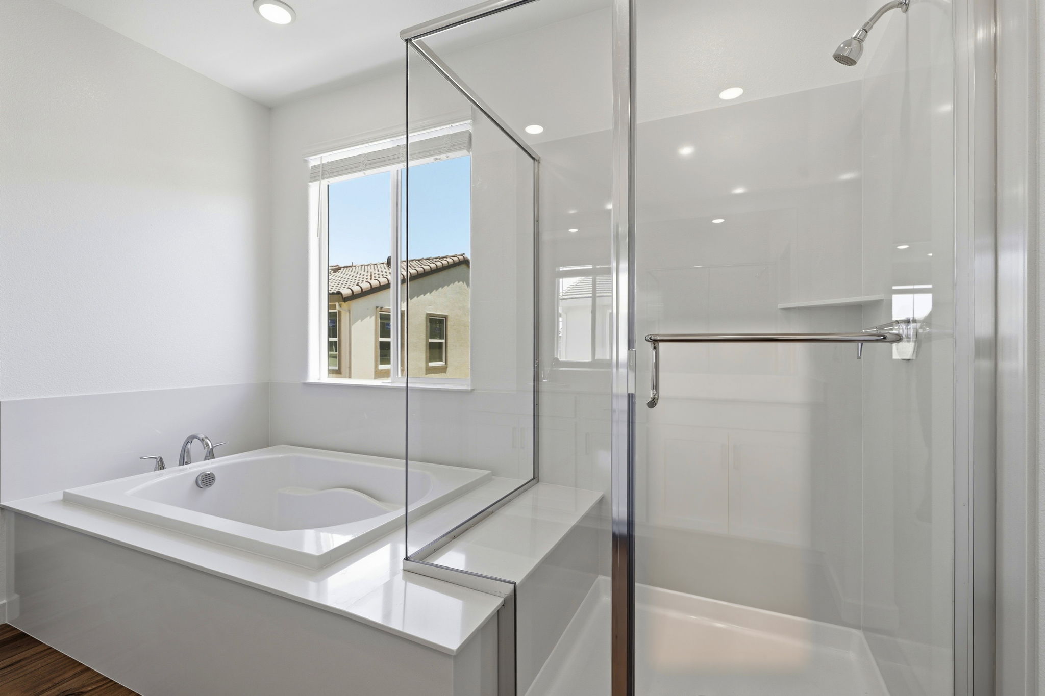 A bathroom with a glass shower.