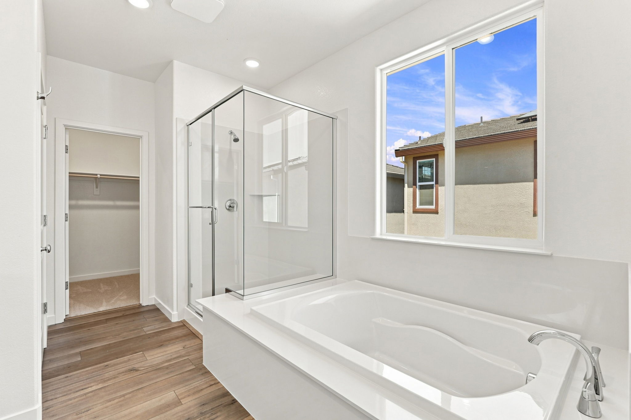 A bathroom with a large window.
